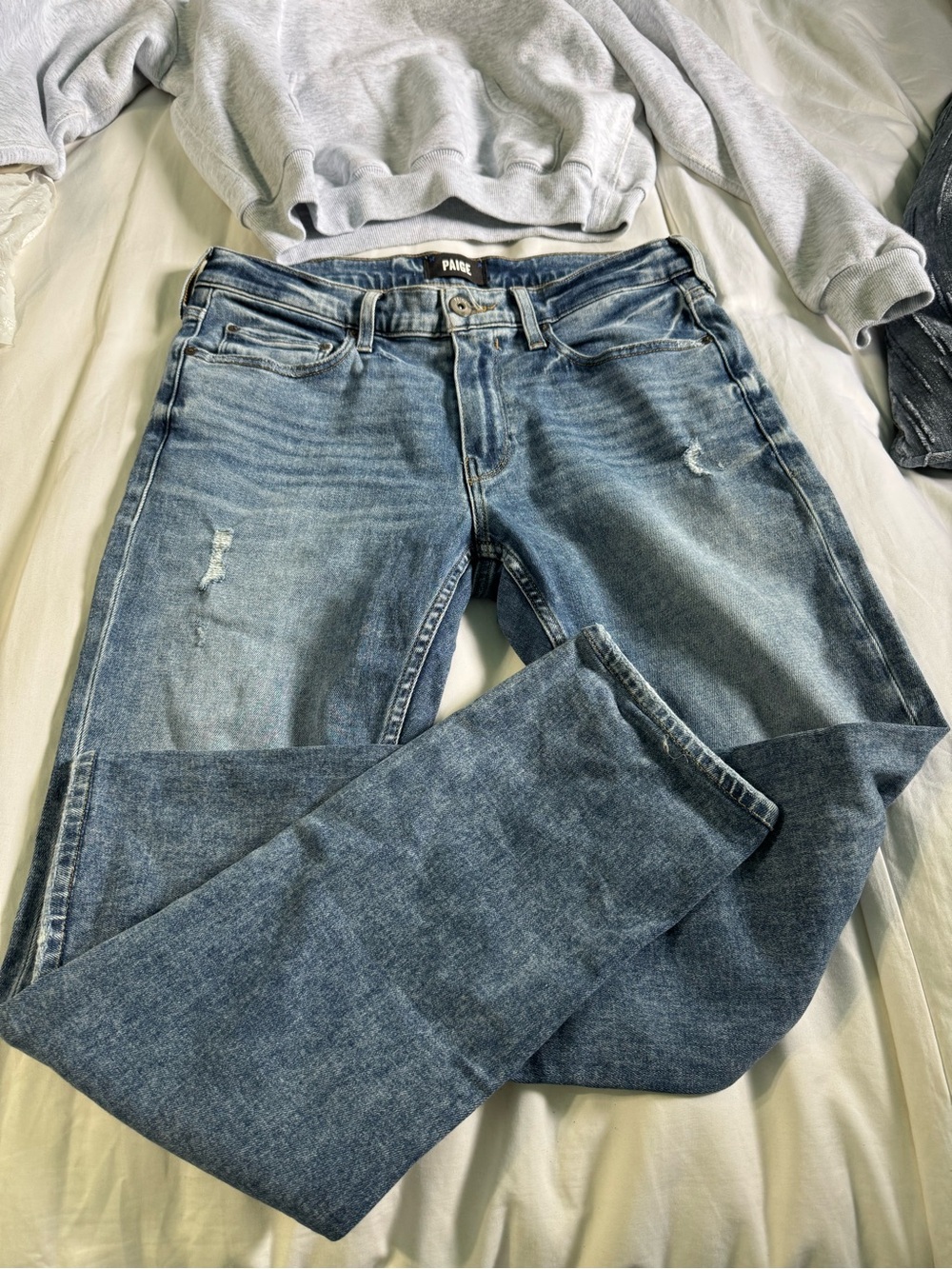 PAIGE Skinny Jeans in Faded Blue Wash Mild Distressing